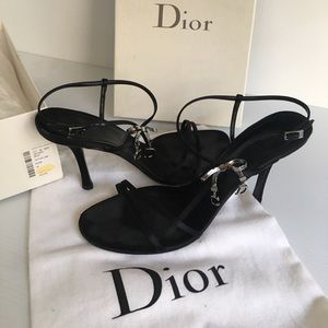 Door strap heals with sliver metal bow, C and D.